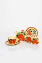 'Cafe au Lait Red Gardenia' a Clarice Cliff Bizarre Stamford tea set for one, painted in colours