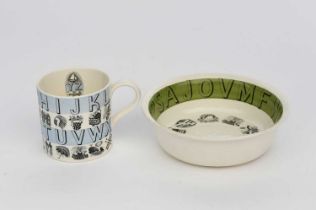 A small Wedgwood Pottery Alphabet mug designed by Eric Ravilious, printed in black on blue and white