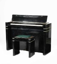 λ An Everstaffe Pianette and stool, ebonised wood with chrome bands, with ivory keyboard, stencil