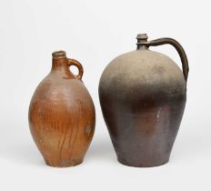 A nineteenth century Bellarmine style salt-glaze stoneware flagon, shouldered form, the shoulder and