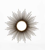 A Chaty Vallauris Sunburst wall mirror, gilt patinated metal frame, cast marks, 85.5cm wide.