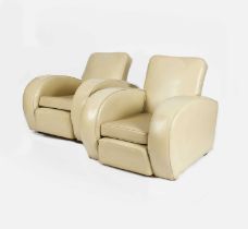 A pair of Art Deco streamlined armchairs, covered in a mushroom leather, unsigned, 83cm wide, 75cm