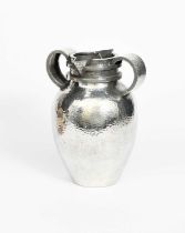 Jean Després (1889-1980) a Modernist tall hammered pewter vase, with twin-handles and spouts, etched