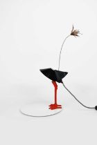 An Ingo Maurer Bibibibi bird table lamp designed by Ingo Maurer, enamelled metal and plastic on a