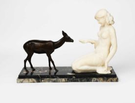 Alberto Saccardi (1883-1956) Lady Kneeling, Feeding a Deer, alabaster and patinated bronze on a