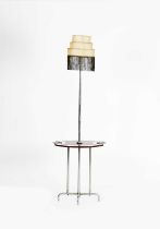 An Art Deco chrome tray table and floor light, the oval tray with two circular ashtrays, unsigned,