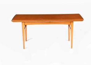 A Scandinavian EM Bordet mahogany expanding coffee table, shaped rectangular top, on four tapering