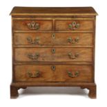 A GEORGE III MAHOGANY CHEST C.1770 the rectangular top with a moulded edge above a brushing slide,