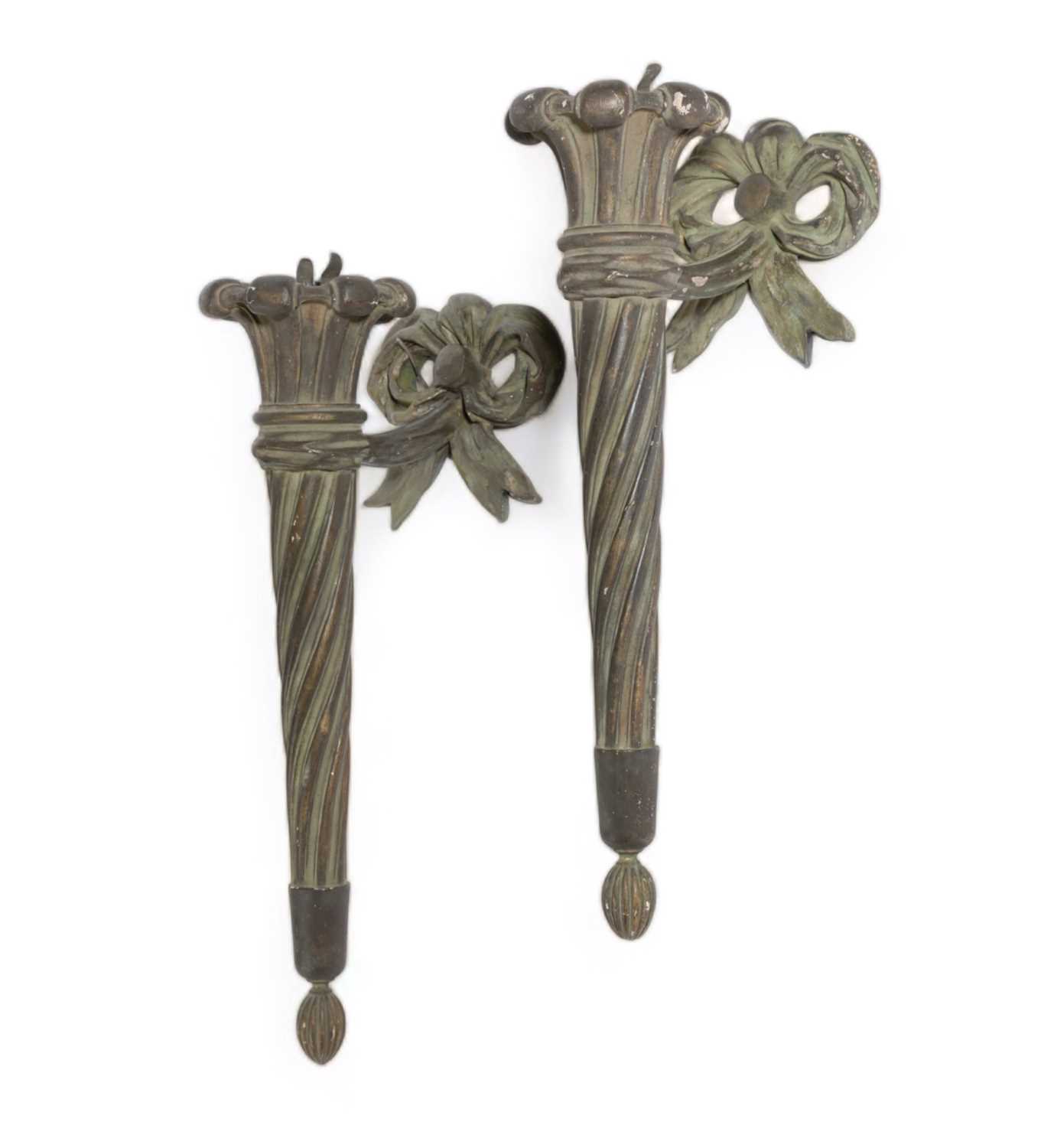 A PAIR OF CARVED PATINATED GILT FLAMBEAU WALL LIGHTS EARLY 20TH CENTURY of twisting fluted