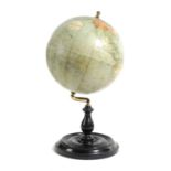 A PHILIP'S 9INCH GLOBE BY GEORGE PHILIPS AND SON, EARLY 20TH CENTURY on an ebonised stand 42.5cm