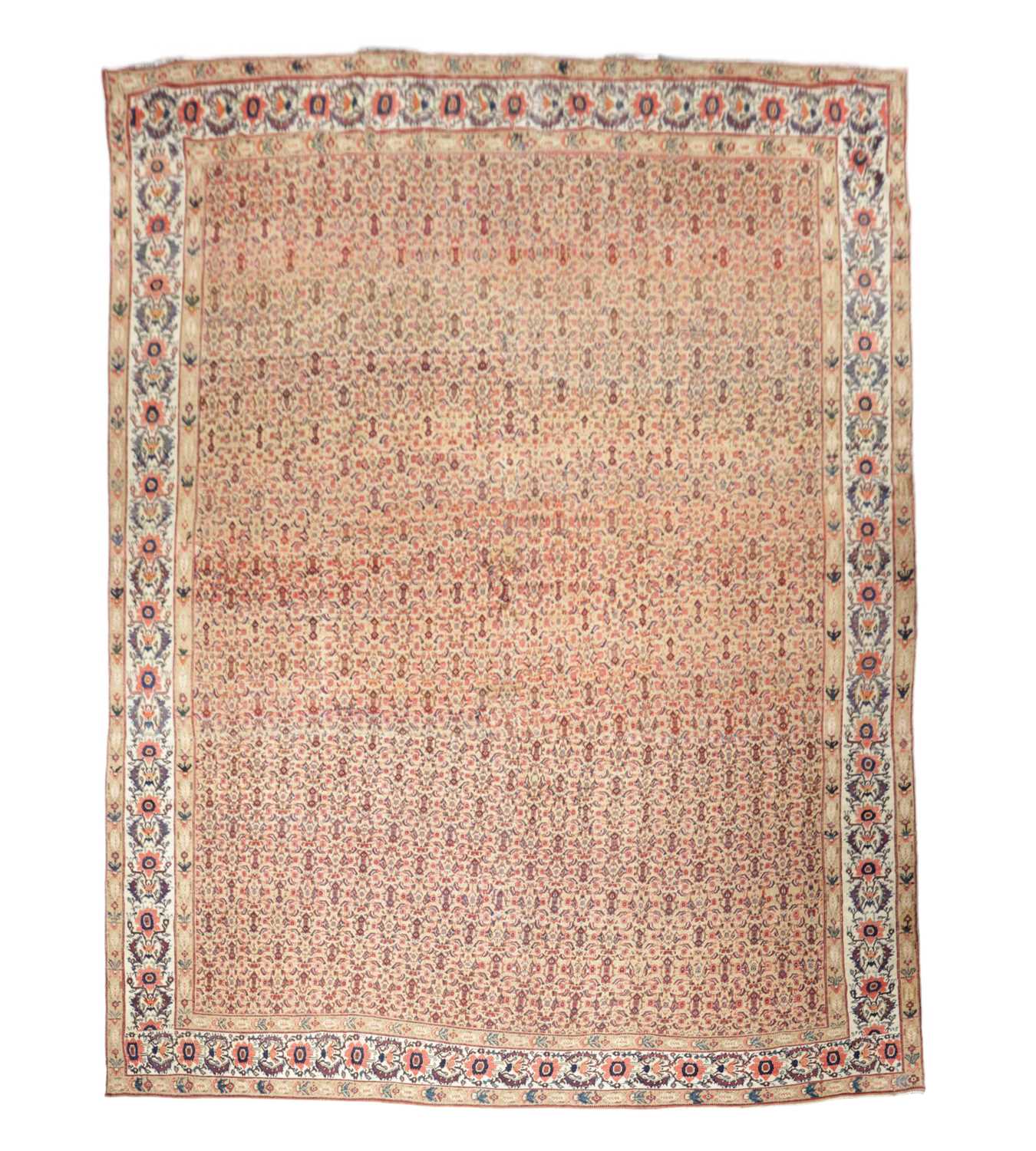 A SENNEH CARPET PERSIAN KURDISTAN, C.1900 the pale camel Herati field enclosed by ivory flowerhead