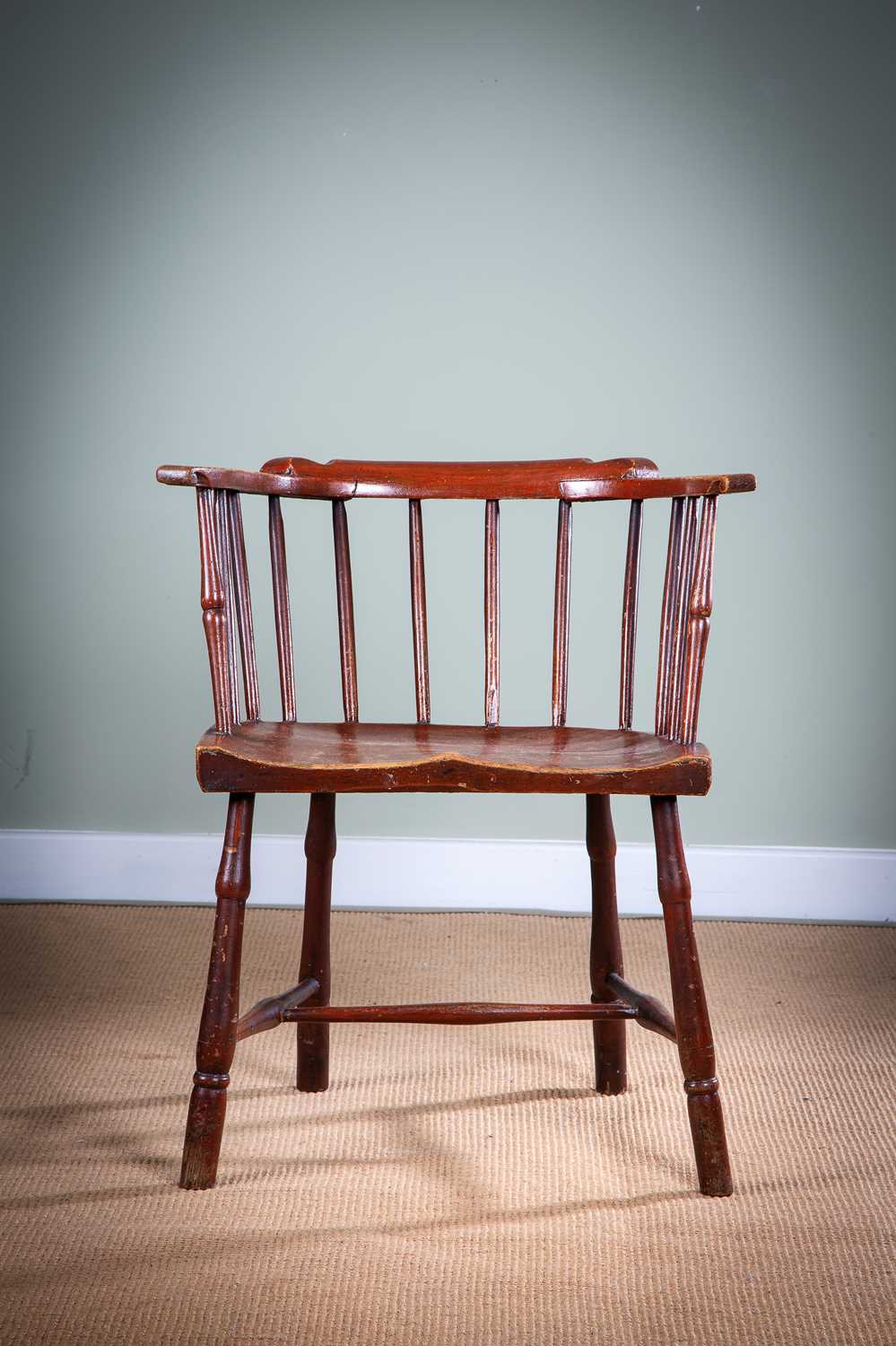 A GEORGE III PAINTED STICK BACK WINSDOR ARMCHAIR POSSIBLY WEST COUNTRY, C.1800 in ash and elm,