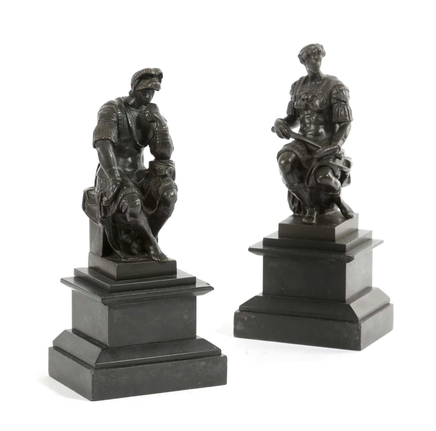 A PAIR OF ITALIAN BRONZE GRAND TOUR FIGURES OF LORENZO AND GIULIANO DE MEDICI AFTER MICHELANGELO (