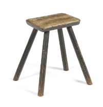 A GEORGE III VERNACULAR ELM DAIRY STOOL LATE 18TH / EARLY 19TH CENTURY the base with original