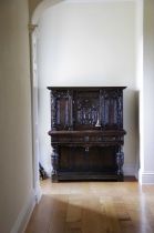 AN ENGLISH OAK CABINET ON STAND WITH 17TH CENTURY ELEMENTS, CONSTRUCTED IN THE 20TH CENTURY the