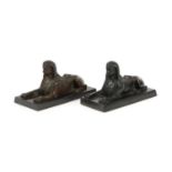 A MATCHED PAIR OF FRENCH BRONZE SPHINX 19TH CENTURY modelled recumbent, on black marble bases (2)