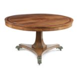 λ A REGENCY ROSEWOOD CENTRE TABLE EARLY 19TH CENTURY the circular tilt-top with partridge wood