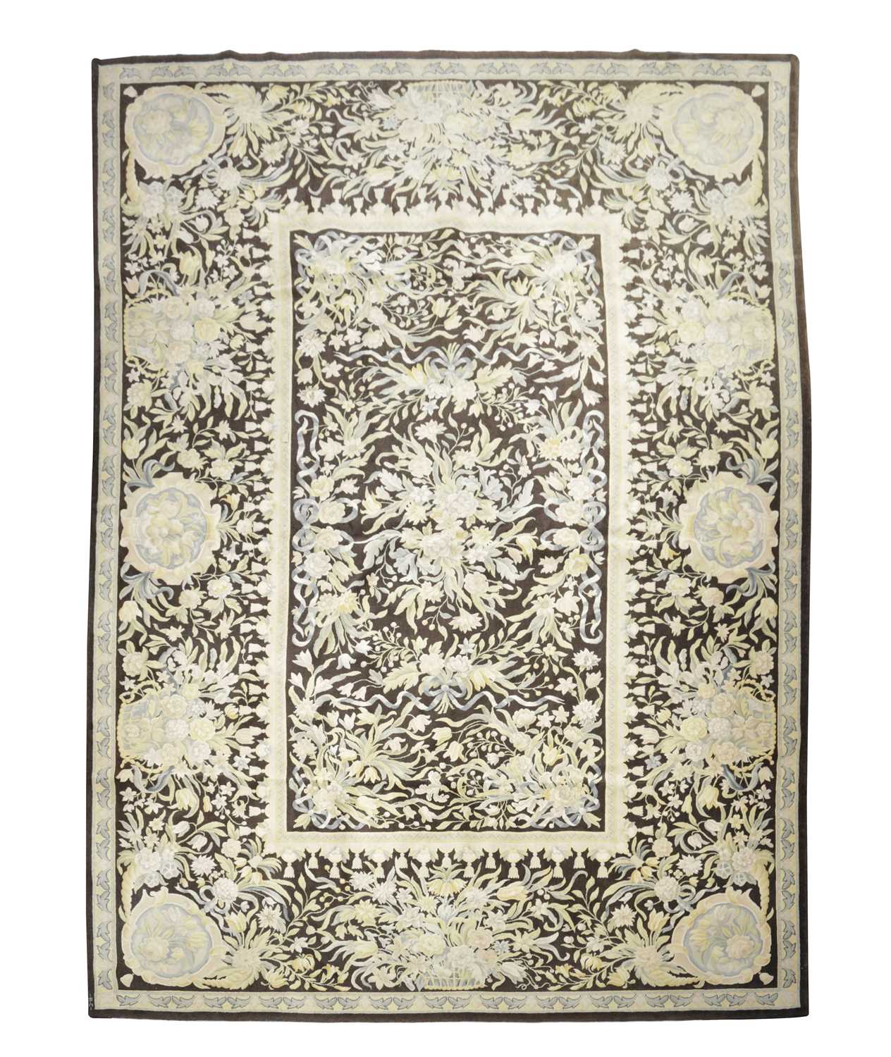 A LARGE CARPET OF 18TH CENTURY EUROPEAN DESIGN, 20TH CENTURY, the pale charcoal field centered by