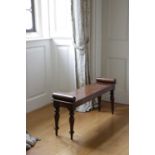 AN EARLY VICTORIAN MAHOGANY HALL BENCH C.1840 the seat with a pair of cylindrical bolsters, on