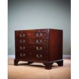 AN EARLY GEORGE III MAHOGANY CHEST C.1760 the caddy moulded top above a brushing slide and four