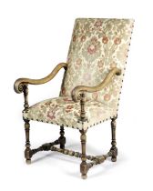 A WALNUT HIGHBACK ARMCHAIR IN WILLIAM AND MARY STYLE, 19TH CENTURY the padded back and seat