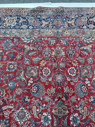 A GOOD KASHAN CARPET CENTRAL PERSIA, C.1940 the abrashed raspberry field with an all over design - Image 4 of 22
