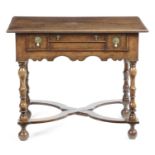 A WILLIAM AND MARY OAK SIDE TABLE LATE 17TH CENTURY the rectangular top above a single drawer with