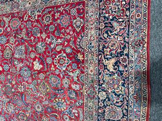 A GOOD KASHAN CARPET CENTRAL PERSIA, C.1940 the abrashed raspberry field with an all over design - Image 20 of 22