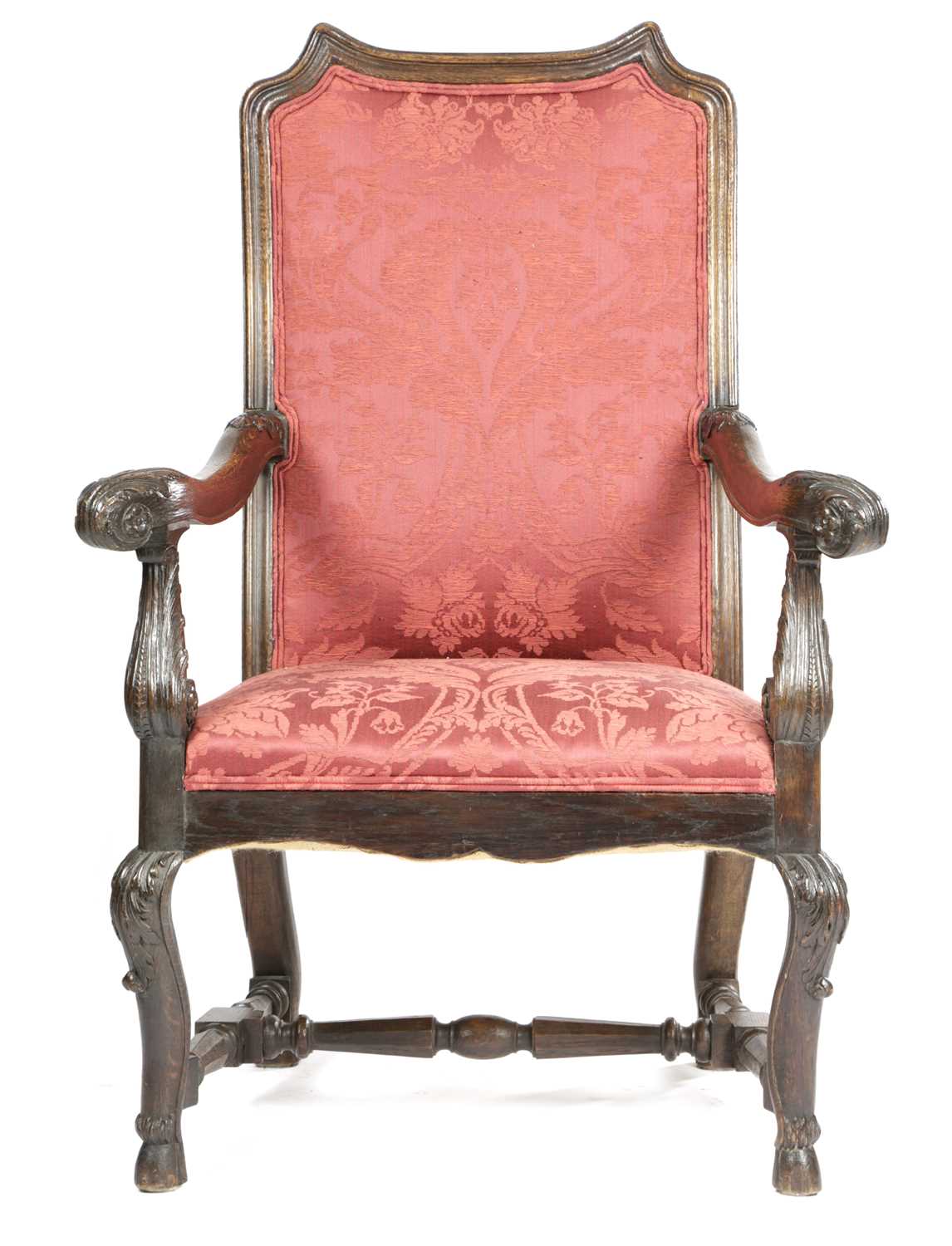 A FRENCH OAK ARMCHAIR IN 17TH CENTURY STYLE, C.1870, the shaped rectangular and upholstered back