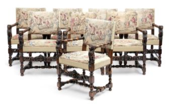 A SET OF EIGHT ITALIAN WALNUT DINING CHAIRS IN RENAISSANCE STYLE, IN THE MANNER OF ANGIOLIO BARBETTI