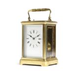 A FRENCH GILT BRASS CARRIAGE CLOCK LATE 19TH CENTURY the brass eight day repeating movement with a