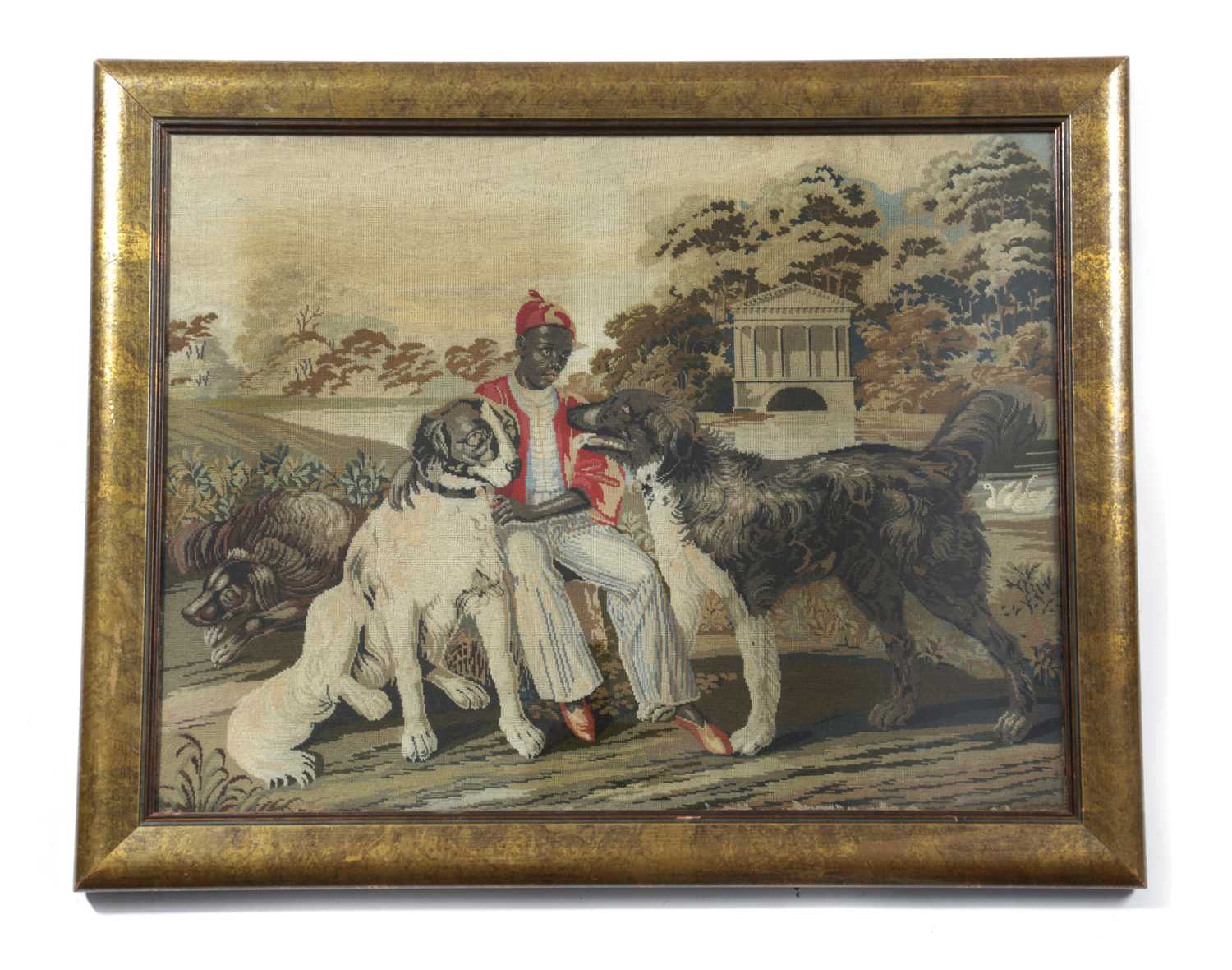 A REGENCY NEEDLEWORK PANEL C.1820-40 worked in coloured wools in petit point, with an Afro-Caribbean