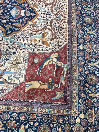 AN UNUSUAL INDIAN CARPET C.1960 the ivory field with trees, vines and mythological animals around - Image 4 of 18