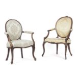 TWO MAHOGANY ARMCHAIRS IN THE MANNER OF GILLOWS, 18TH CENTURY AND LATER each with a padded back,