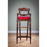 λ AN ANGLO-INDIAN ROSEWOOD CHILD'S HIGH CHAIR IN THE MANNER OF GILLOWS, 1830-40 with a cane seat and