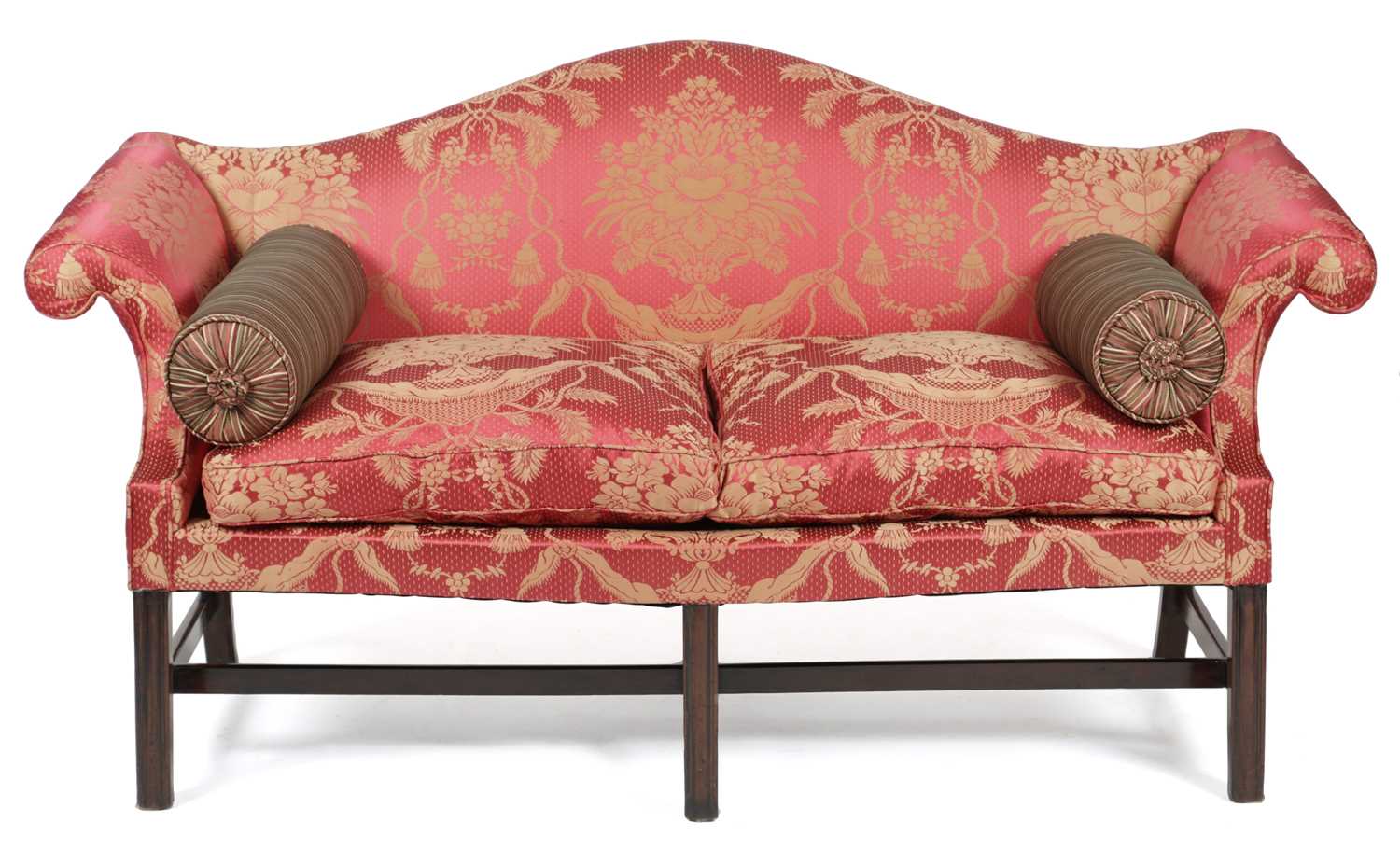 A GEORGE III MAHOGANY SOFA C.1760 the serpentine back above scrolling arms, above serpentine seat