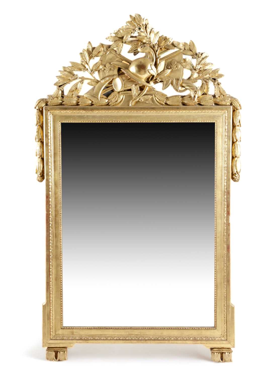 A FRENCH GILTWOOD MIRROR IN LOUIS XVI STYLE, 19TH CENTURY the rectangular plate within a moulded