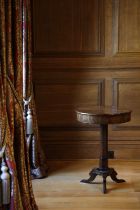 A MALTESE OLIVEWOOD AND EBONY DRUM TABLE LATE 18TH / EARLY 19TH CENTURY the segmented veneered top