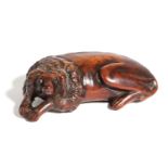 A RARE TREEN KING CHARLES SPANIEL SNUFF BOX EARLY 18TH CENTURY carved recumbent facing sinister,