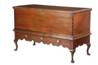 A RARE BERMUDAN CEDAR TRUNK ON STAND MID-18TH CENTURY the hinged top revealing a vacant interior,