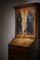 A FINE WILLIAM AND MARY WALNUT BUREAU BOOKCASE C.1700 the moulded cornice above a pair of mirrored