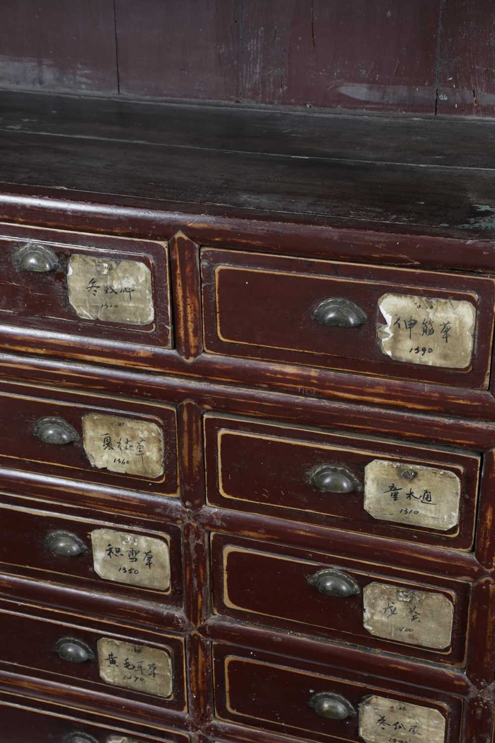 A CHINESE AUBERGINE LACQUER ELM SHOP DISPLAY CABINET LATE 19TH / EARLY 20TH CENTURY the top - Image 6 of 6