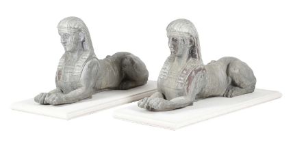 A PAIR OF BULBECK FOUNDRY LEAD GARDEN SPHINXES 20TH CENTURY modelled recumbent, on Haddonstone