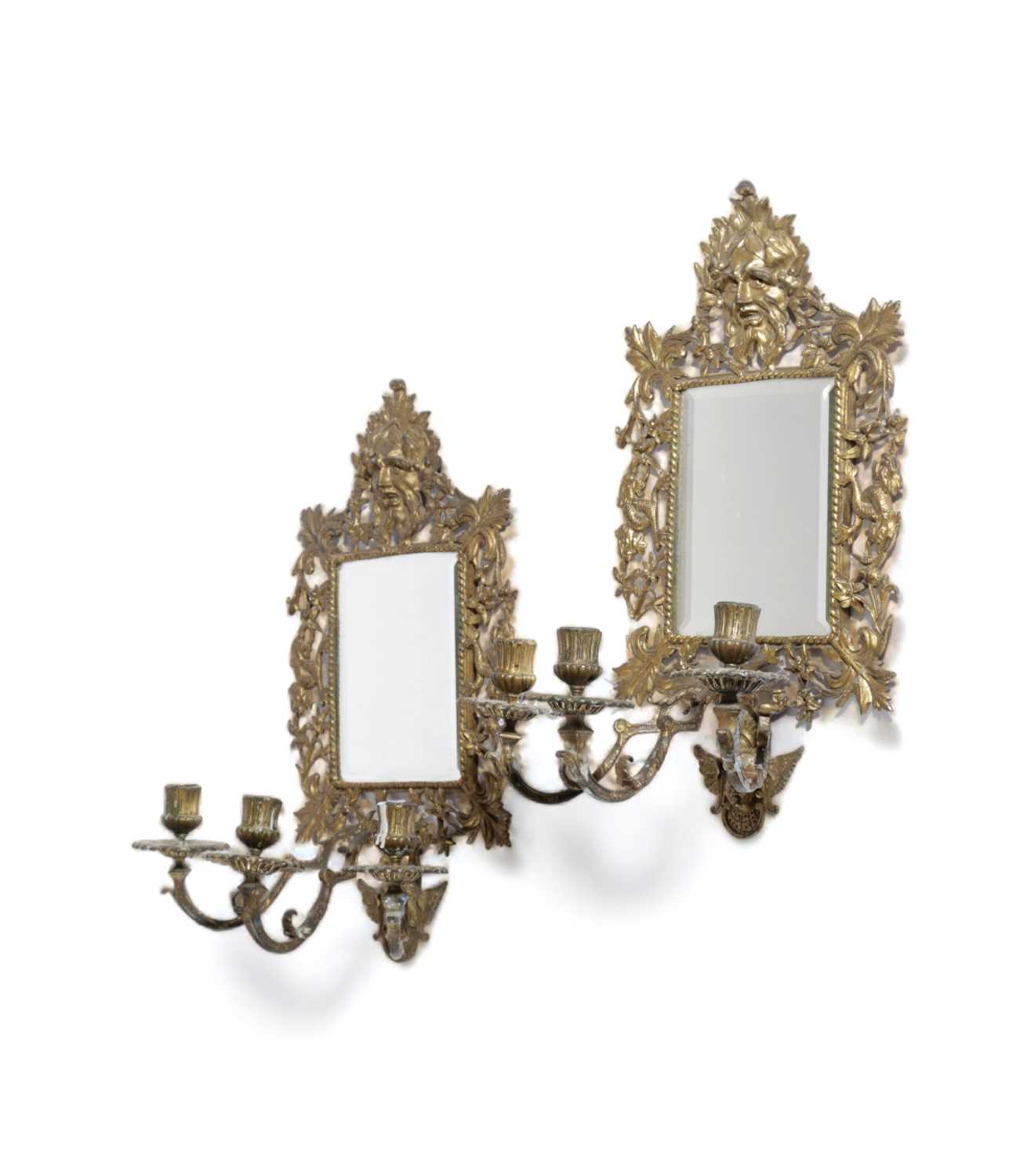 A PAIR OF VICTORIAN GILT BRASS WALL MIRRORS PROBABLY IRISH, MID-19TH CENTURY each with a bevelled
