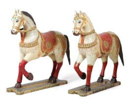 A LARGE PAIR OF INDIAN PAINTED WOOD HORSES RAJASTHAN, MID-20TH CENTURY each polychrome decorated
