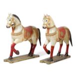 A LARGE PAIR OF INDIAN PAINTED WOOD HORSES RAJASTHAN, MID-20TH CENTURY each polychrome decorated