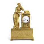 A FRENCH EMPIRE ORMOLU MANTEL CLOCK EARLY 19TH CENTURY the brass eight day movement with a silk