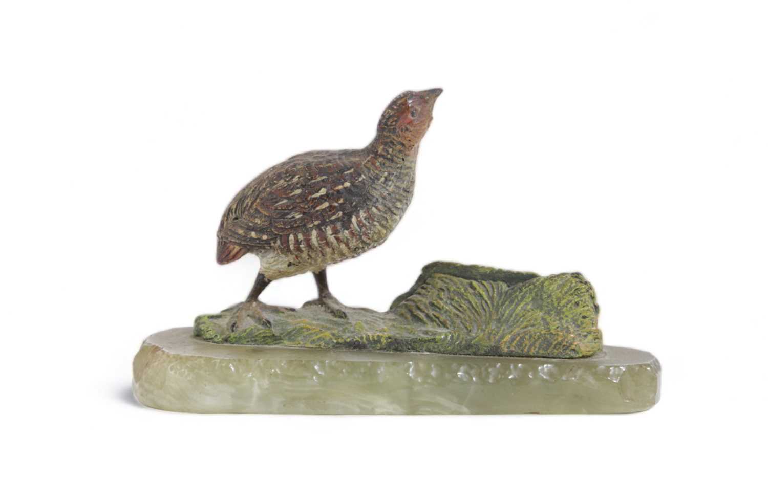 AN AUSTRIAN COLD FRANCE PAINTED BRONZE GROUSE MENU HOLDER IN THE MANNER OF BERGMAN, LATE 19TH