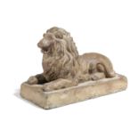 A STONEWARE FIGURE OF A RECUMBENT LION LATE 19TH CENTURY on a rectangular plinth 25cm high, 37cm