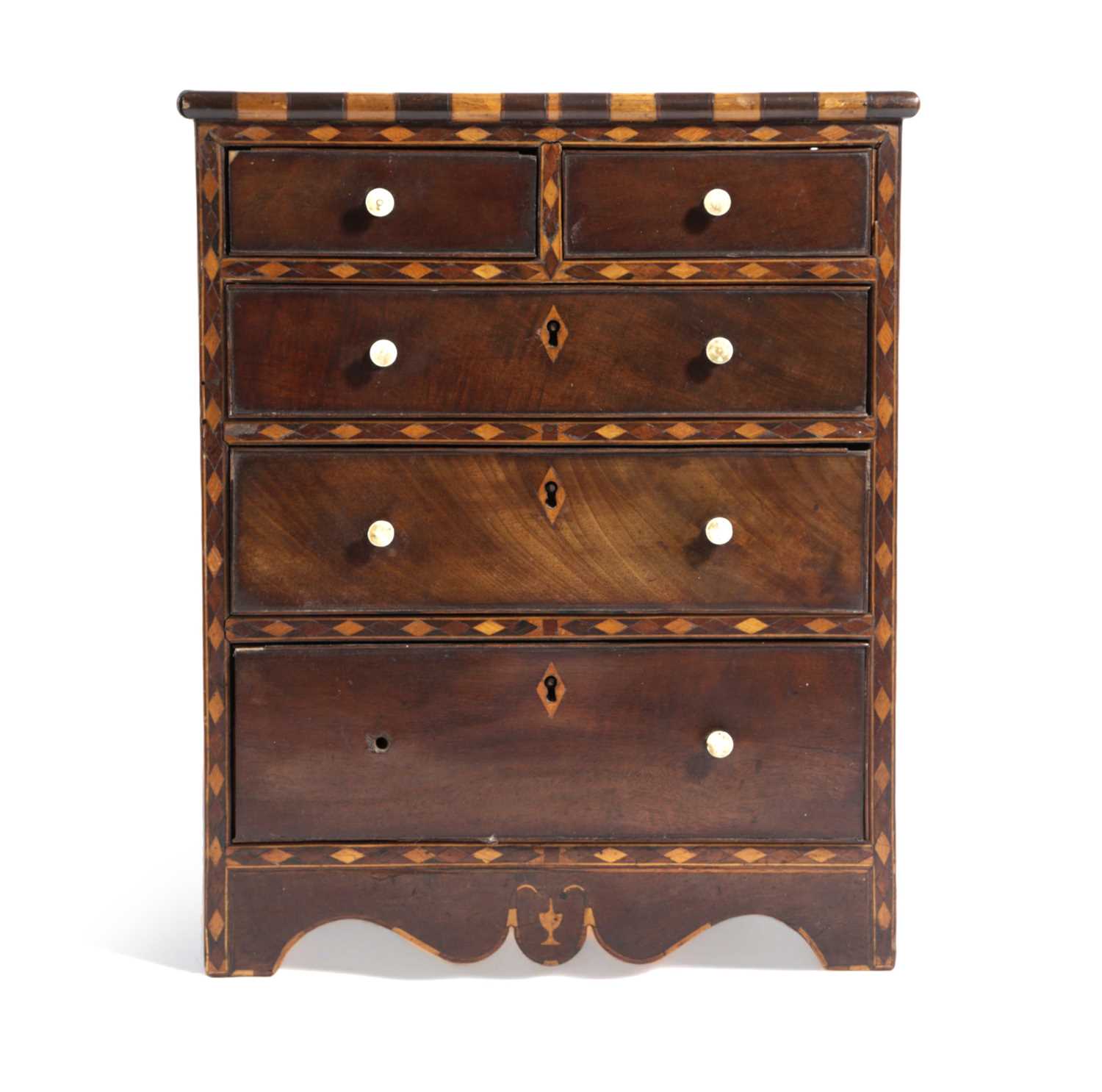 λ A REGENCY MAHOGANY MINIATURE CHEST POSSIBLY SCOTTISH, EARLY 19TH CENTURY with two short and